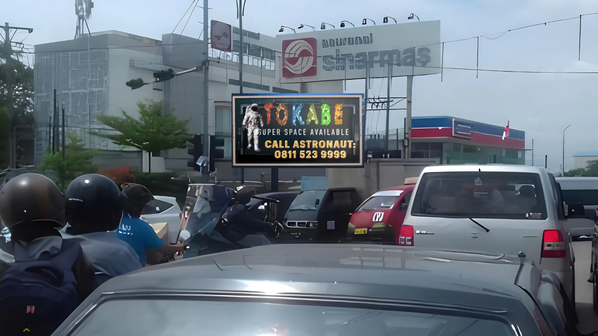 Layanan Videotron DOOH Tokabe.id - Jl. SM Raja Loket Bus PMH - Iklan videotron Medan murah